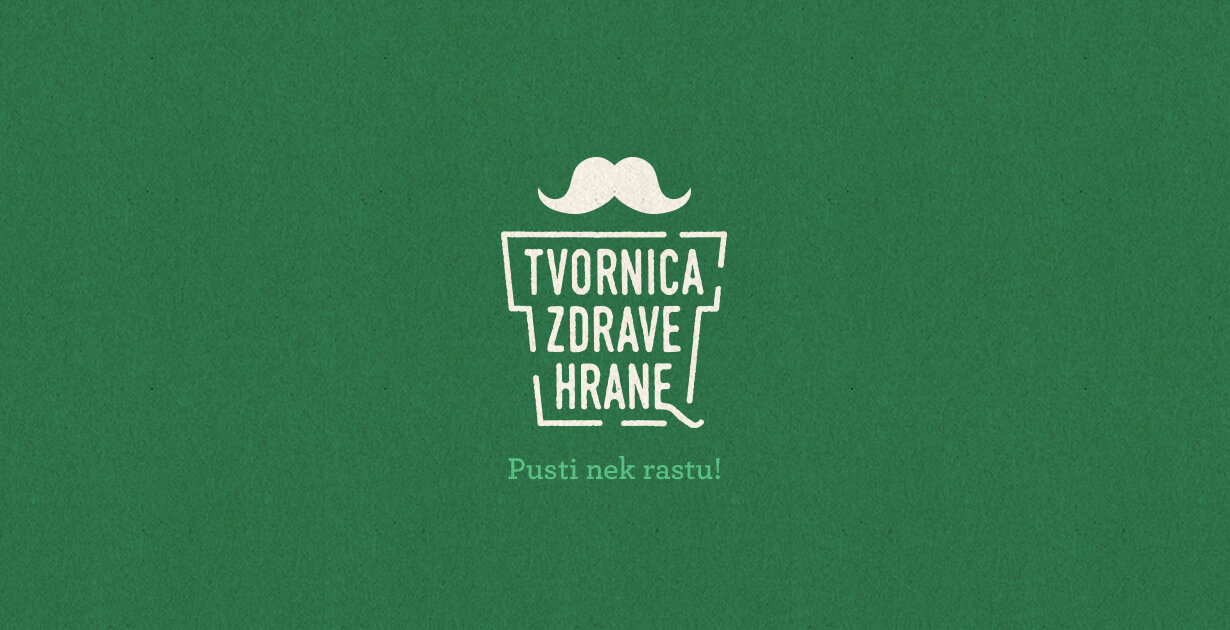 Stilizirani logo Tvornice Zdrave Hrane s brkovima na zelenoj pozadini