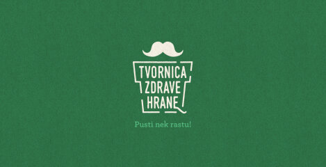 Stilizirani logo Tvornice Zdrave Hrane s brkovima na zelenoj pozadini